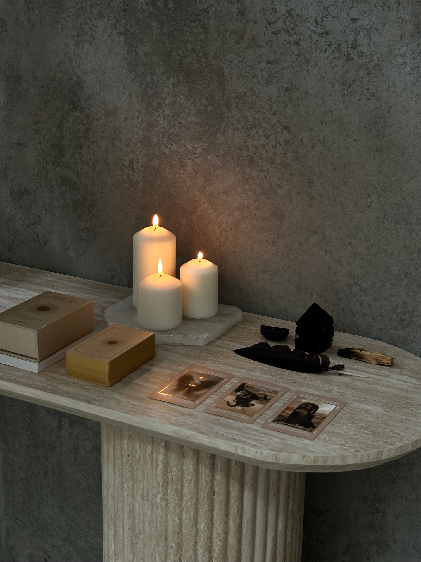 Altar with candles, crystals and tarot